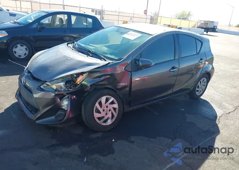 2015 Toyota Prius C One z USA, uszkodzony, nr VIN JTDKDTB34F1581740